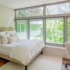 Bedroom with natural lighting and high ceilings